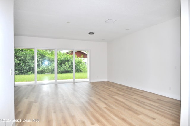 1043 Walden Blvd SE, Palm Bay, FL 32909 - empty room featuring light wood-style floors