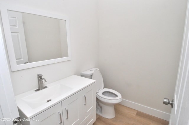 1043 Walden Blvd SE, Palm Bay, FL 32909 - half bathroom featuring vanity and wood finished floors