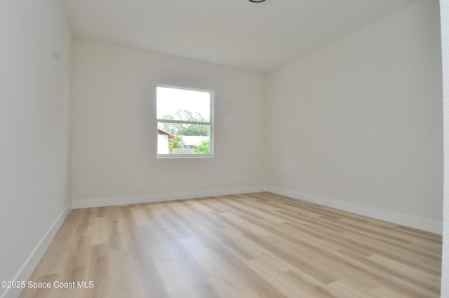 1043 Walden Blvd SE, Palm Bay, FL 32909 - spare room featuring light wood finished floors and baseboards