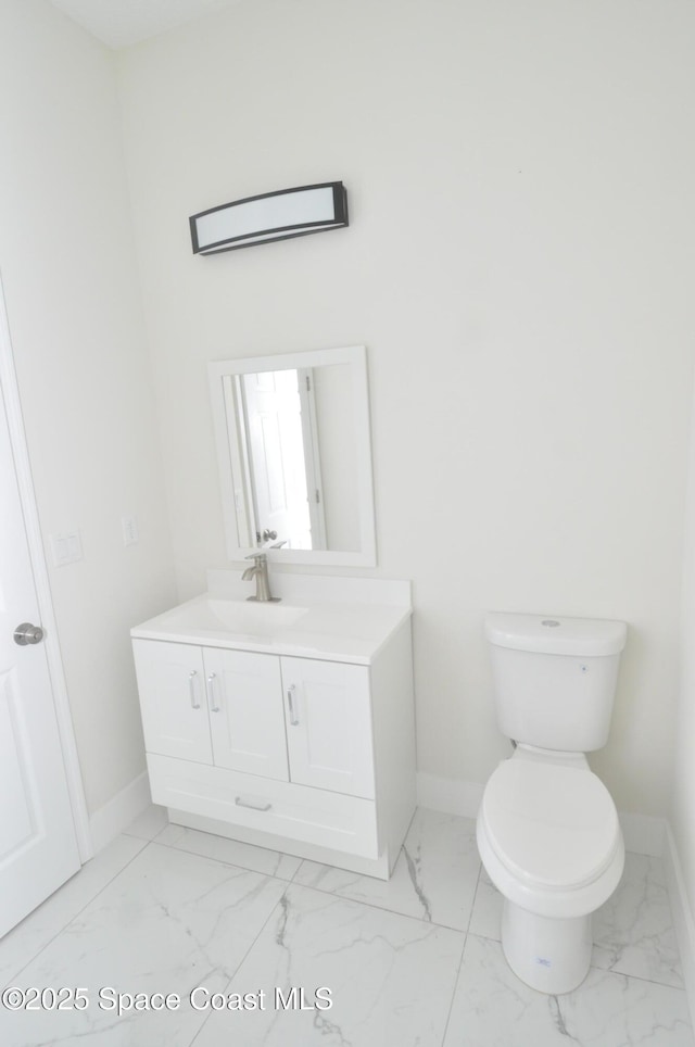 1043 Walden Blvd SE, Palm Bay, FL 32909 - bathroom with marble finish flooring and vanity