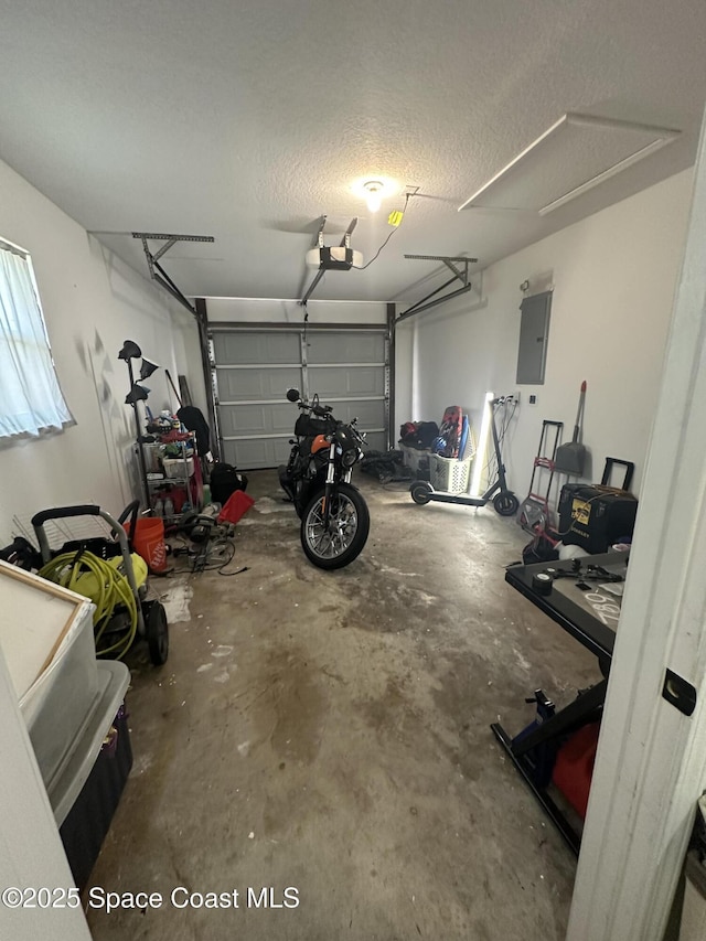6240 Grissom Pkwy, Cocoa, FL 32927 - garage with electric panel and a garage door opener