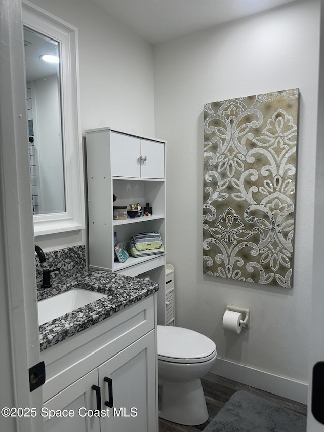 6240 Grissom Pkwy, Cocoa, FL 32927 - bathroom with vanity and wood finished floors