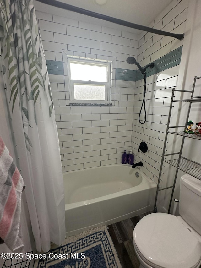6240 Grissom Pkwy, Cocoa, FL 32927 - bathroom with shower / tub combo with curtain and wood finished floors