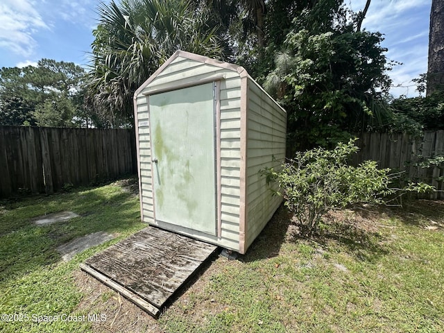 6240 Grissom Pkwy, Cocoa, FL 32927 - view of shed with a fenced backyard