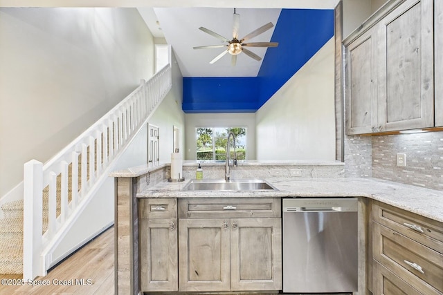1720 Minutemen Cswy Unit 3, Cocoa Beach, FL 32931 - kitchen featuring dishwasher, a ceiling fan, a peninsula, light wood-style floors, and light stone countertops