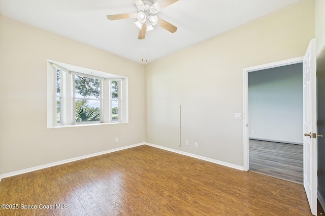 1720 Minutemen Cswy Unit 3, Cocoa Beach, FL 32931 - spare room featuring wood finished floors and a ceiling fan