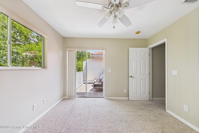 1720 Minutemen Cswy Unit 3, Cocoa Beach, FL 32931 - carpeted empty room with ceiling fan and baseboards