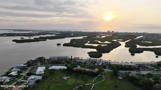 1720 Minutemen Cswy Unit 3, Cocoa Beach, FL 32931 - aerial overview of property's location with a nearby body of water and a golf club