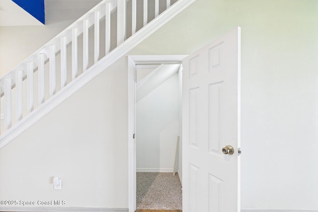 1720 Minutemen Cswy Unit 3, Cocoa Beach, FL 32931 - staircase with baseboards
