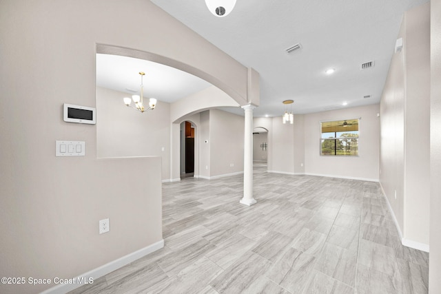 3645 Salt Marsh Cir, West Melbourne, FL 32904 - spare room featuring arched walkways, a chandelier, and recessed lighting
