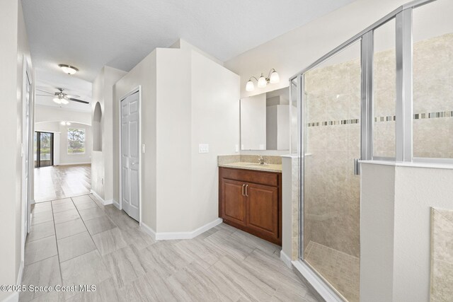 3645 Salt Marsh Cir, West Melbourne, FL 32904 - full bathroom featuring vanity, a stall shower, ceiling fan, and tile patterned floors