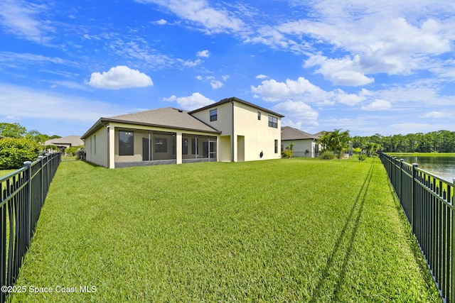 3645 Salt Marsh Cir, West Melbourne, FL 32904 - back of property with a fenced backyard, stucco siding, a sunroom, and a shingled roof
