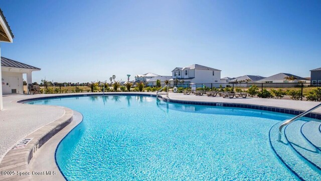 777 Clearwater Ave, Satellite Beach, FL 32937 - community pool with a patio