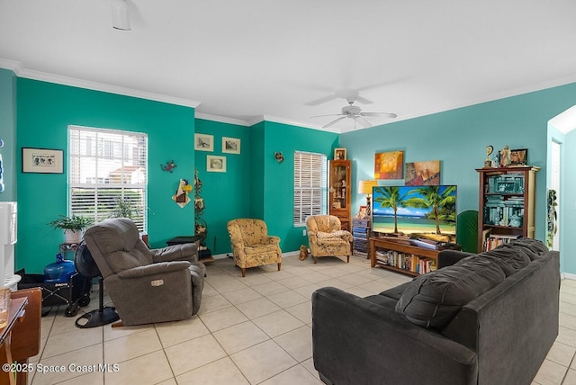 2416 57th Cir, Vero Beach, FL 32966 - living room with light tile patterned floors, crown molding, and a ceiling fan