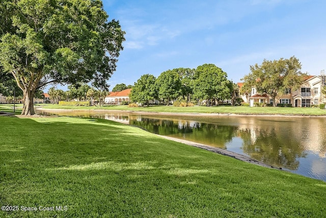 2416 57th Cir, Vero Beach, FL 32966 - surrounding community featuring a water view and a lawn