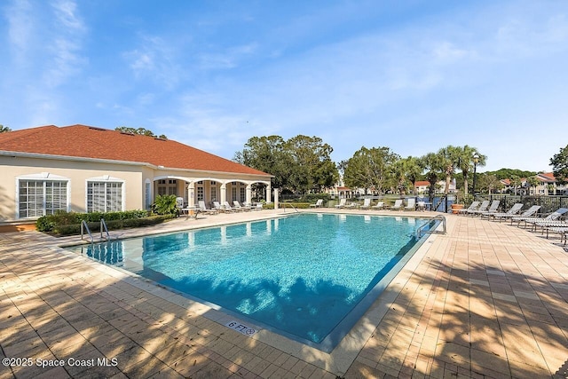 2416 57th Cir, Vero Beach, FL 32966 - community pool featuring a patio