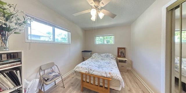 699 Bimini Rd, Satellite Beach, FL 32937 - bedroom with light wood-style floors and a ceiling fan