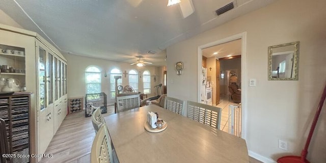 699 Bimini Rd, Satellite Beach, FL 32937 - dining area featuring a ceiling fan and light wood-style floors