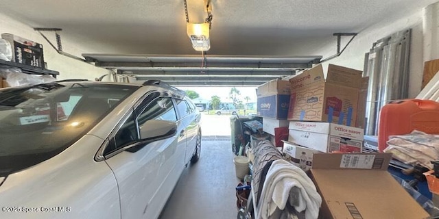 699 Bimini Rd, Satellite Beach, FL 32937 - garage featuring a garage door opener