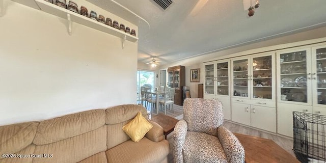 699 Bimini Rd, Satellite Beach, FL 32937 - living area with a ceiling fan and wood finished floors