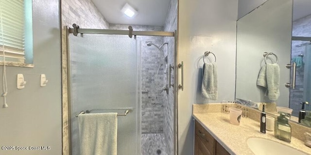 699 Bimini Rd, Satellite Beach, FL 32937 - full bath with a stall shower and double vanity