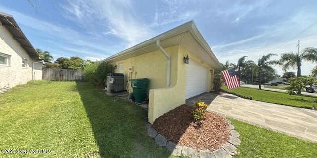 699 Bimini Rd, Satellite Beach, FL 32937 - view of property exterior featuring driveway and stucco siding