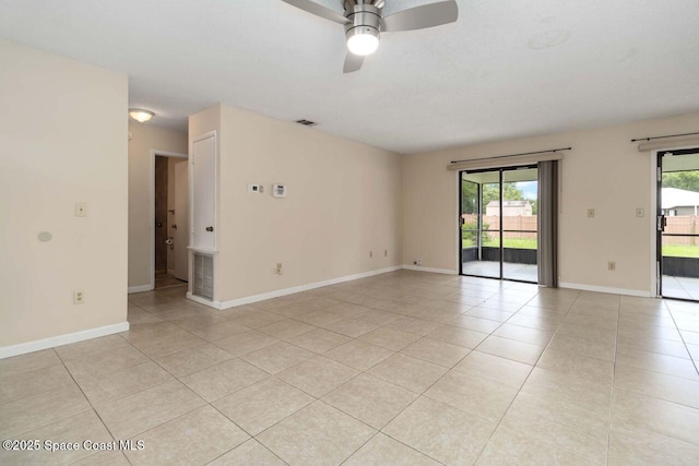1572 Talavera St SE, Palm Bay, FL 32909 - unfurnished room featuring ceiling fan and light tile patterned floors