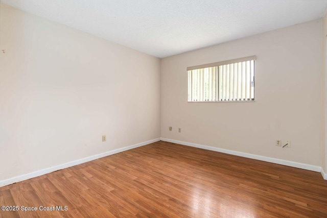 1572 Talavera St SE, Palm Bay, FL 32909 - empty room with wood finished floors