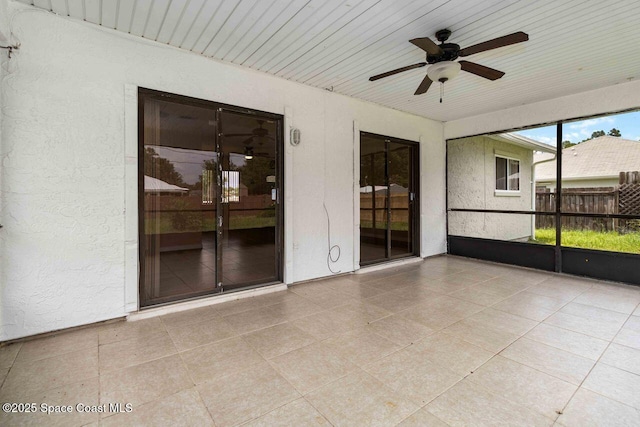 1572 Talavera St SE, Palm Bay, FL 32909 - unfurnished sunroom with ceiling fan