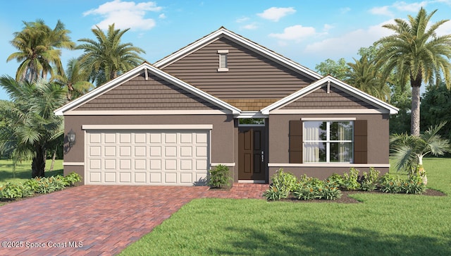 3708 Maya Pl SE, Palm Bay, FL 32909 - view of front of property with a front lawn, decorative driveway, an attached garage, and stucco siding