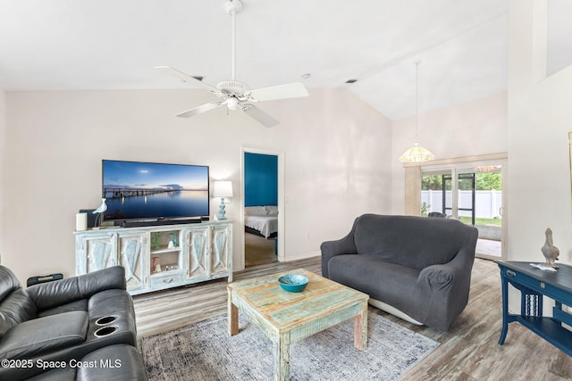 878 Croton Rd, Rockledge, FL 32955 - living area featuring wood finished floors, ceiling fan, and high vaulted ceiling