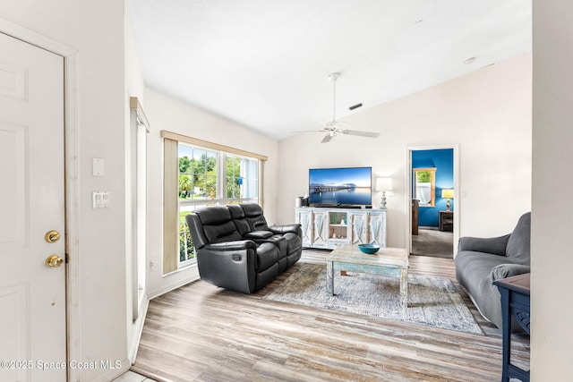878 Croton Rd, Rockledge, FL 32955 - living room featuring lofted ceiling, wood finished floors, and a ceiling fan