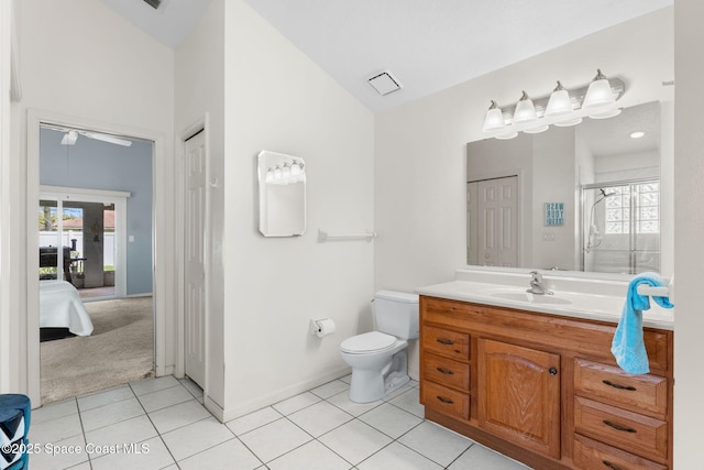 878 Croton Rd, Rockledge, FL 32955 - full bath with tile patterned flooring, vanity, healthy amount of natural light, a shower with door, and lofted ceiling