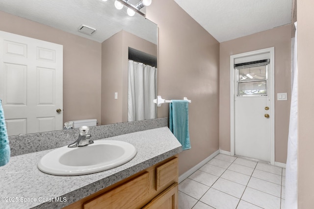 878 Croton Rd, Rockledge, FL 32955 - bathroom with vanity and tile patterned flooring