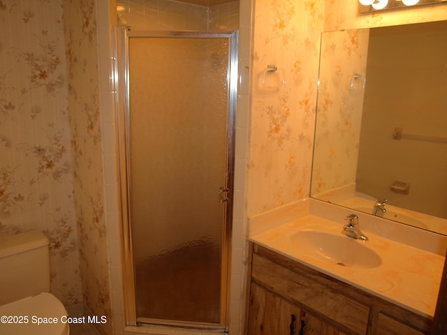 9020 York Ln Unit C, West Melbourne, FL 32904 - bathroom featuring wallpapered walls, vanity, and a shower stall