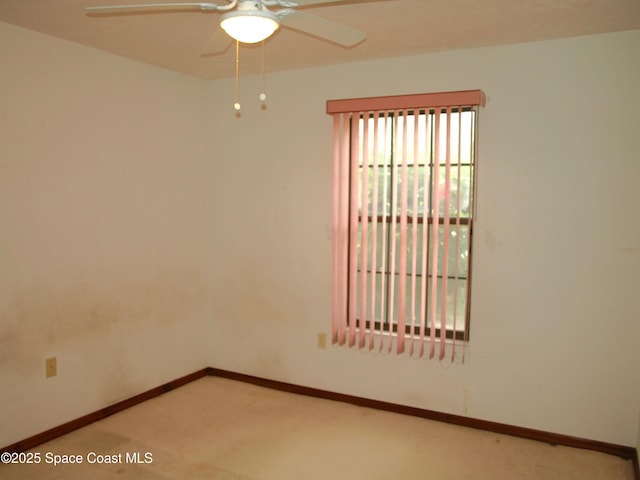 9020 York Ln Unit C, West Melbourne, FL 32904 - spare room featuring ceiling fan and light carpet