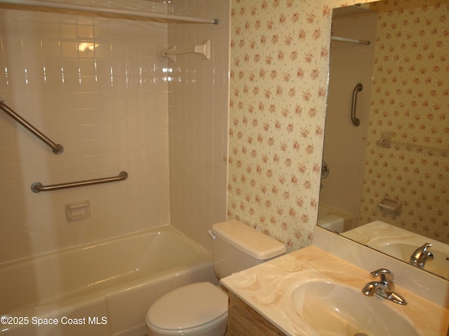 9020 York Ln Unit C, West Melbourne, FL 32904 - bathroom featuring wallpapered walls, vanity, and shower / washtub combination
