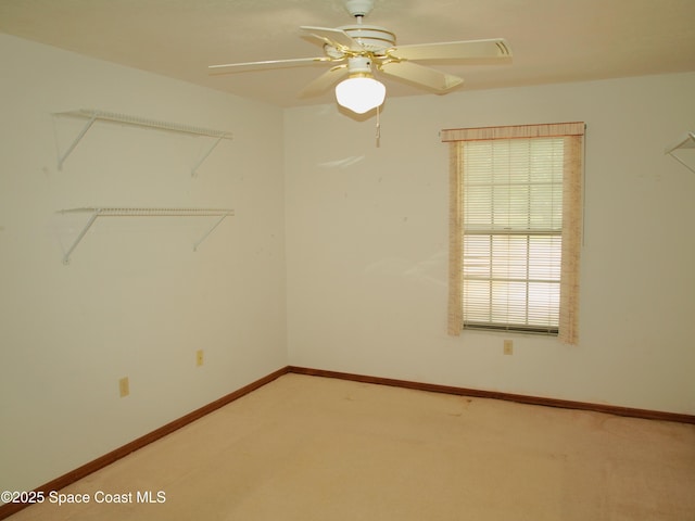 9020 York Ln Unit C, West Melbourne, FL 32904 - empty room featuring carpet floors and ceiling fan