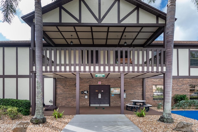 9020 York Ln Unit C, West Melbourne, FL 32904 - property entrance with brick siding and stucco siding