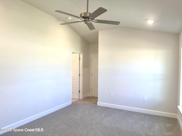 1245 Kylar Dr NW, Palm Bay, FL 32907 - unfurnished bedroom featuring carpet floors, lofted ceiling, and ceiling fan