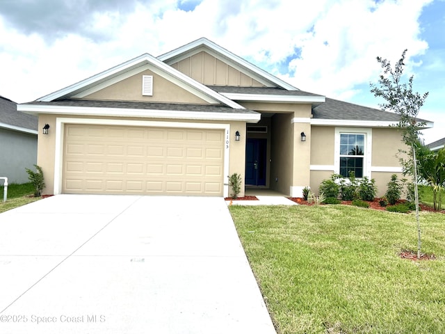 1245 Kylar Dr NW, Palm Bay, FL 32907 - single story home featuring a garage, concrete driveway, a front yard, stucco siding, and a shingled roof
