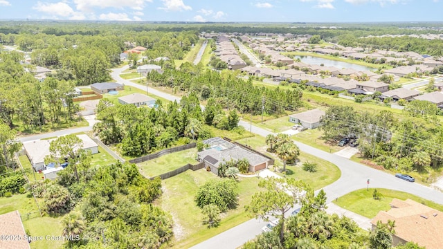2606 Tepee Ave SE, Palm Bay, FL 32909 - aerial perspective of suburban area with a large body of water