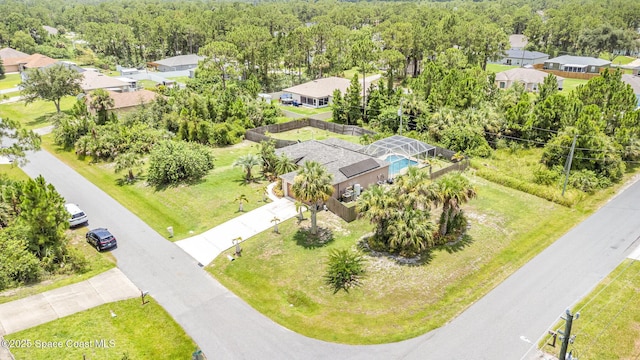 2606 Tepee Ave SE, Palm Bay, FL 32909 - aerial perspective of suburban area with a heavily wooded area