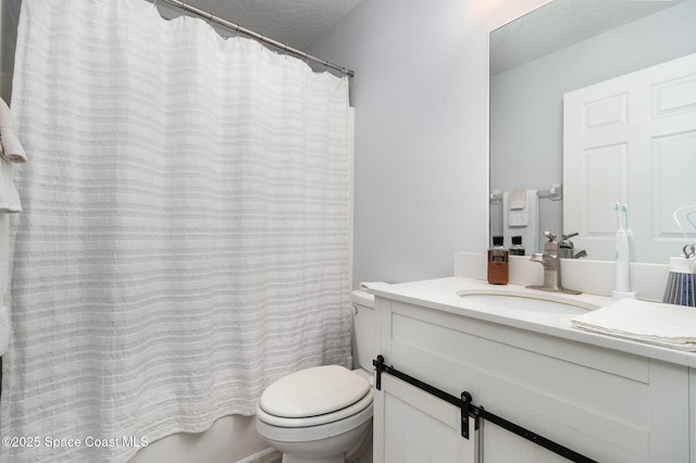 2606 Tepee Ave SE, Palm Bay, FL 32909 - bathroom featuring vanity and a textured ceiling