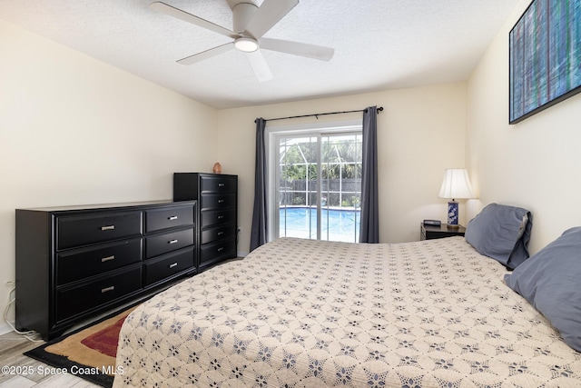 2606 Tepee Ave SE, Palm Bay, FL 32909 - bedroom with access to outside, wood finished floors, and ceiling fan