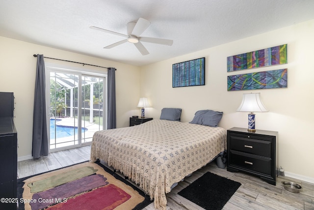 2606 Tepee Ave SE, Palm Bay, FL 32909 - bedroom with access to exterior, light wood-type flooring, and a ceiling fan