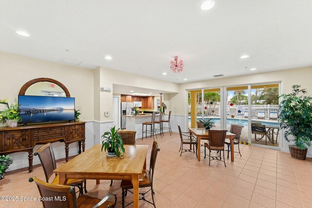 1 Eighth Ave Unit 1201, Indialantic, FL 32903 - dining area featuring recessed lighting and light tile patterned floors
