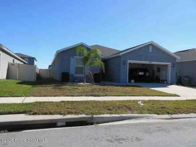 837 Cambridge Dr, Winter Haven, FL 33881 - ranch-style home with an attached garage and concrete driveway