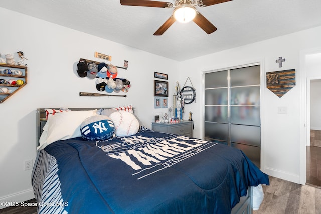 405 Lake View Ln, Grant-Valkaria, FL 32909 - bedroom featuring wood finished floors and ceiling fan