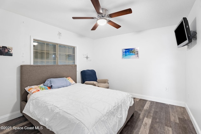 405 Lake View Ln, Grant-Valkaria, FL 32909 - bedroom with dark wood-style floors and ceiling fan